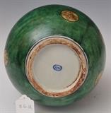 Chinese Green Glazed Double Gourd Vase
Decorated with animal medallions, the underside with oval underglaze blue mark.  14 1/2" high, approximately 8" diameter.  Bid at www.fairfieldauction.com today through Wed. July 20th