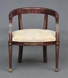 Regency Style Mahogany Tub Chair
With gilt-metal mounts, cream upholstery. 28 1/2" high, 24 1/2" wide, 9 1/2" deep.  Bid at www.fairfieldauction.com today through Wed. July 20th