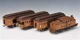 Pre-WWII, standard gauge, baby brown, comprising: Engine 318E, Pullman car 309, Railway Mail car 310 and Observation car 312.  Each approximately 13" long.  Bid at www.fairfieldauction.com today through Wed. July 20th