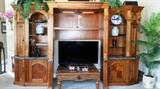 Gorgeous entertainment center, comes in three pieces and can accommodate a large TV. Must see to appreciate.