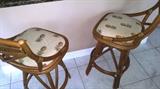 Very nice rattan with pineapple upholstery bar stools