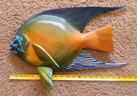 Close-up of hand painted wood fish