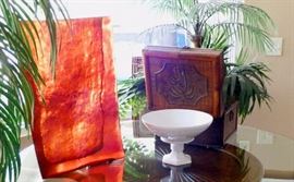 Very large red glass flat vase. Silk arrangement in wood box. White ceramic pedestal bowl from Portugal