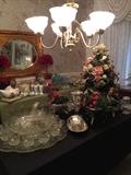 Old punch bowl with under-plate and 12 cups, lighted rose covered tree, silver plate and other glass