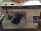 Close up of the Viking Husqvarna Sewing Embroidery machine with case and accessories plus case, model #1