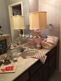 Second bathroom, vintage lamp and linens