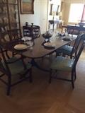 Beacon Hill Numbered Mahogany Dining table and 6 chairs $3200 has pale green leather seats!