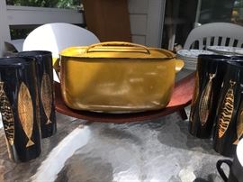 Vintage enamelware and mid-century Fred Press black tumblers with gold gilt fish. 