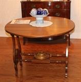 this I believe has a leaf for it - beautiful walnut? table used as a dining table.  The chairs with it were equally gorgeous, however the owner's mother cross stitched them, so they're staying in the family.