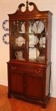 Nice and trim mahogany china cabinet