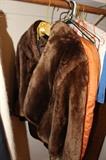 shearling jacket - there's a mink stole in the garment bag next to it.