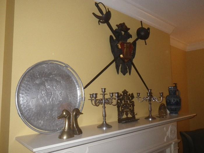 Aluminum tray, brass duck bookends, silver candelabra, brass candleholder, pewter top mug, reproduction sword & shield 