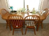 Oak Table and 4 chairs. Various glass, plastic items, and kitchen items