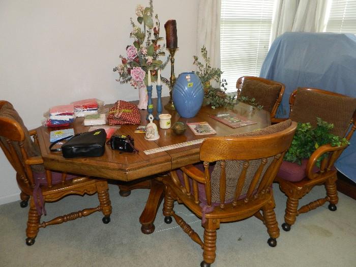 Game table with leaf and four matching chairs on rollers.  Decor items, miscellaneous collectibles 