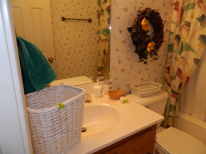 Bathroom in hall - wastebasket, decor, shower curtain set, miscellaneous items