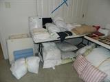 Linens of all kinds - sheet sets, tablecloths, pillows, mattress covers, bedding set with coverlet, shams, and bedskirt, and more