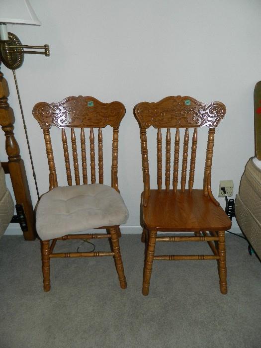 Two excellent chairs to add for additional seating.  Lamp on wall swivels