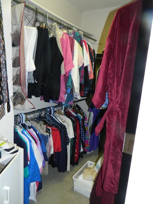 MBR closet again - lots of women's clothes in various sizes from Med, Large, XL - 12 to 16.
