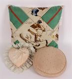 Pillows and textiles from Joan Rivers, including this Hermes Pillow