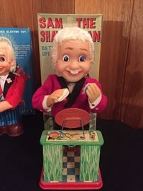 One of many mechanical vintage toys with original boxes.