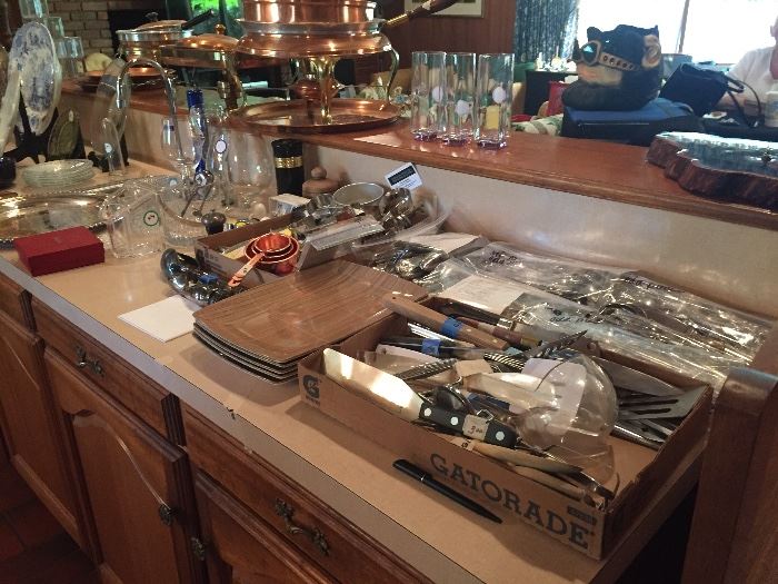 Kitchen flatware, plates, glasses, cups, and lots of utensils !