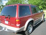 1998 Ford Explorer 4WD Eddie Bauer Edition, Red/Tan, 154,359 miles, Tan leather interior, Sunroof, Hatch-style trunk, Remote key and powerless entry, New battery in 2010, 2 small dings on bumper, Tear in leather on center console, Radio works but LED display doesn't, radiator leaks & needs replacing.