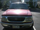 1998 Ford Explorer 4WD Eddie Bauer Edition, Red/Tan, 154,359 miles, Tan leather interior, Sunroof, Hatch-style trunk, Remote key and powerless entry, New battery in 2010, 2 small dings on bumper, Tear in leather on center console, Radio works but LED display doesn't, radiator leaks & needs replacing.
