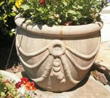Pair of cement planters, 17" high x 21" wide. $50 each