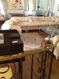 Off white living room sofa as well as a sectional