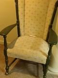 Antique chair on casters