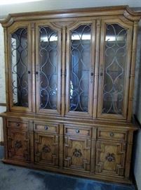 Pecan wood set includes table w/ two 20" leaves & pads, six cane back chairs and china cabinet