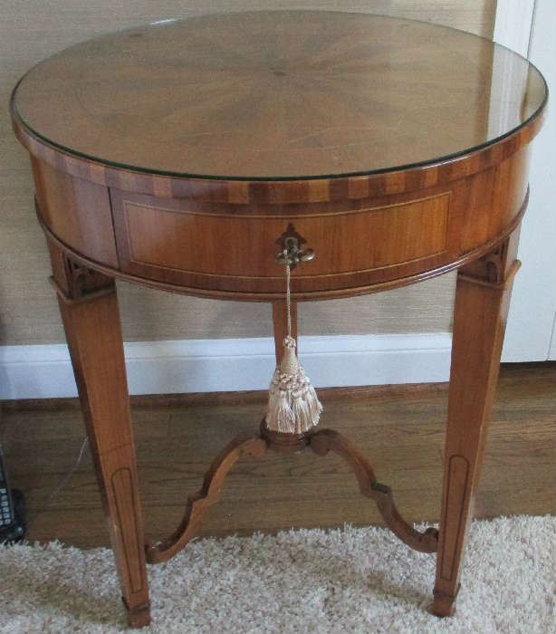 One of a pair of Kreiss inlaid side tables.