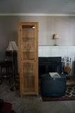Philips Magnavox television, cabinet, floor lamp