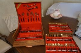 • 1996 Chevrolet Lumina Van
• GE Bottom Freezer-Refrigerator
• GE Upright Deep Freezer
• Whirlpool Estate Heavy Duty Washer
• Whirlpool Estate Dryer
• Tappan Dish Washer
• Electric stove
• Sanyo Microwave
• 1908 White Family Rotary Treadle Sewing Machine
• Vintage Wedding Dress and Veil from 1960
• Matching sofa and loveseat
• Recliner
• Wing Back Chair
• Vintage kitchen table & chairs
• Formal Dining Room Table, 4 chairs, 2 captain’s chairs
• Curio Cabinet
• Vintage Zenith Upright Console Short Wave/FM Radio.
• Television and television stand
• Philips Magnavox television
• Entertainment Center
• Magnavox DVD/VHS player
• China Cabinet
• Stemware
• Royal Straffordshire Dinnerware by Clarice Cliff “Tonguin” made in England
• Lefton china KW3221
• Royal Albert
• David Carter Brown Collection “By the Sea” lighthouse
• Waterford Crystal Clock
• Fenton
Boon Jewelry Ltd. Elegant Brass/Bronze Flatware in wooden Case