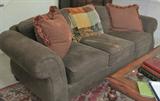 sofa and pillows not a stain but light reflection