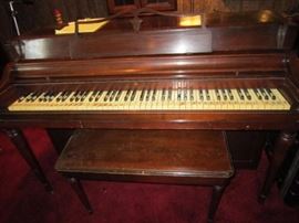 A second Wurlitzer piano with keys marked for playing