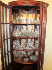 Quarter round corner cabinet.  Can be used with mirrors in the back or remove for wood back.