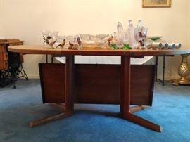 Danish dining table with one leave installed.