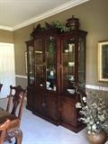 Century breakfront china cabinet.   Mahogany with white ash burl veneers.
