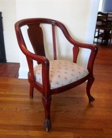 Arm Chair:  Dark cherry frame, front claw feet, on wheels, innerspring seat