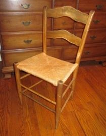 Four antique chairs, all wood construction (no nails, screws), with original rush seats.