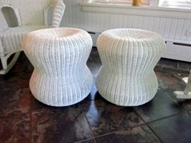 Pair of white wicker end tables.