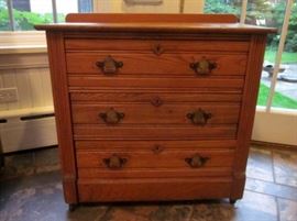 Antique Eastlake 3-drawer chest/wash stand, on wheels. Slight condition issues.