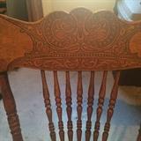 Pressed back oak rocking chair