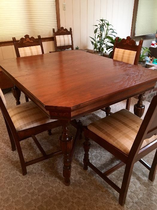 Antique dining room table with chairs 