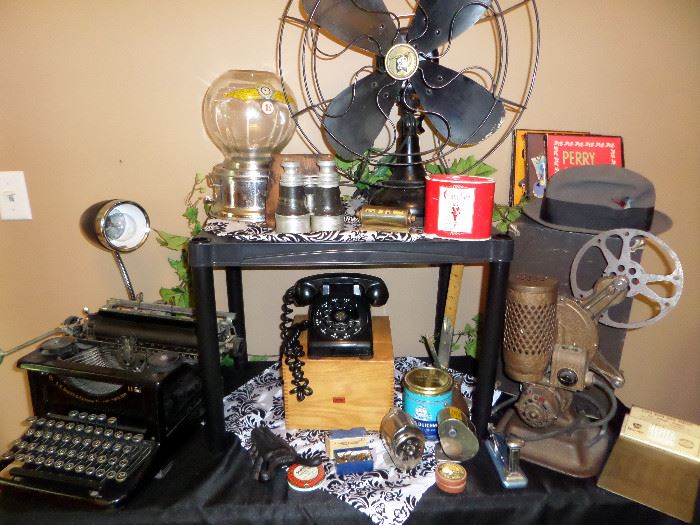 L.C SMITH TYPEWRITER, ANTIQUE FAN, ANTIQUE MOVIE CAMERA WITH CASE, VINTAGE TELEPHONE, VINTAGE BUBBLE GUM MACHINE AND MORE