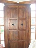 Sweater armoire of solid wood.