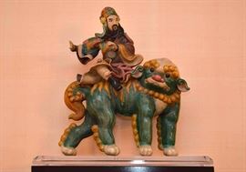 Chinese Polychrome Glazed Ceramic Roof Tile Decoration Depicting a Man Riding a Foo Dog