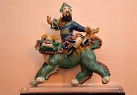 Chinese Polychrome Glazed Ceramic Roof Tile Decoration Depicting a Man Riding a Foo Dog