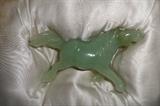 details of one of the pair of carved jade horses (in original box) purchased in China many years ago